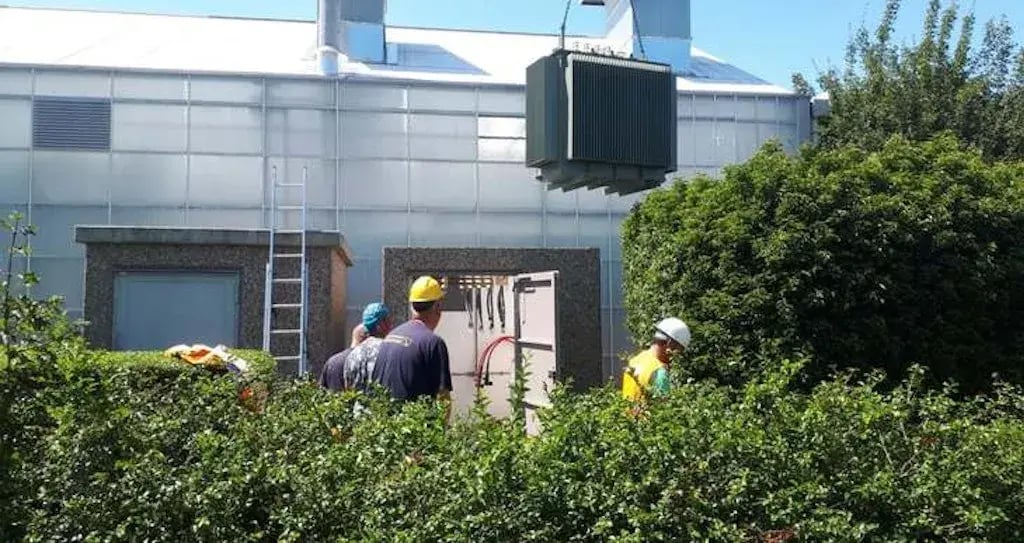 Contruction workers building a house