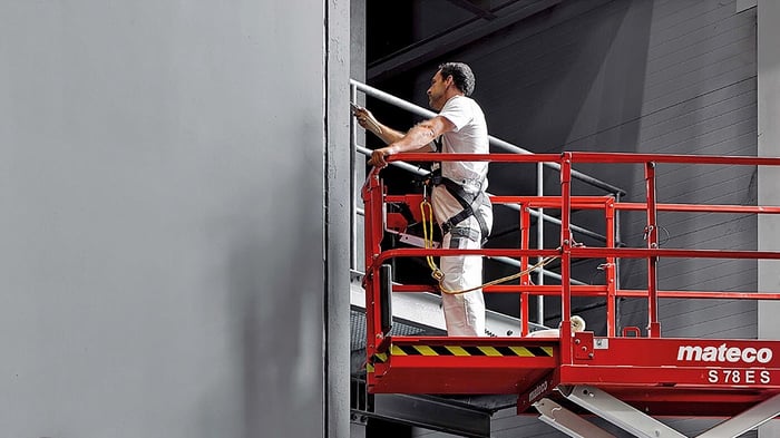 Man working on scaffolding.