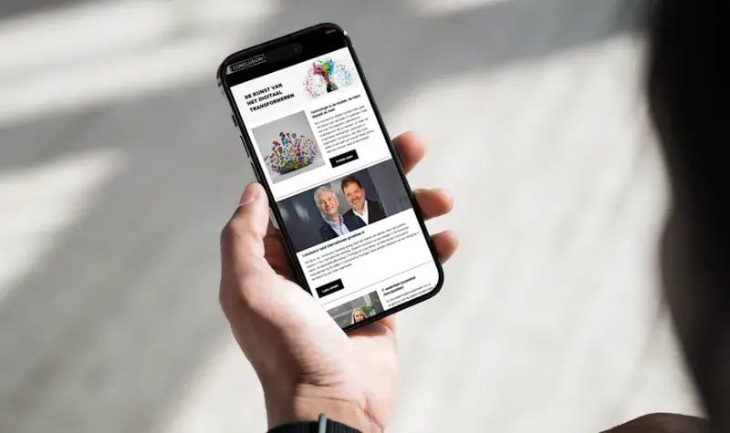 Sign up for our newsletter on a phone in someones hand.