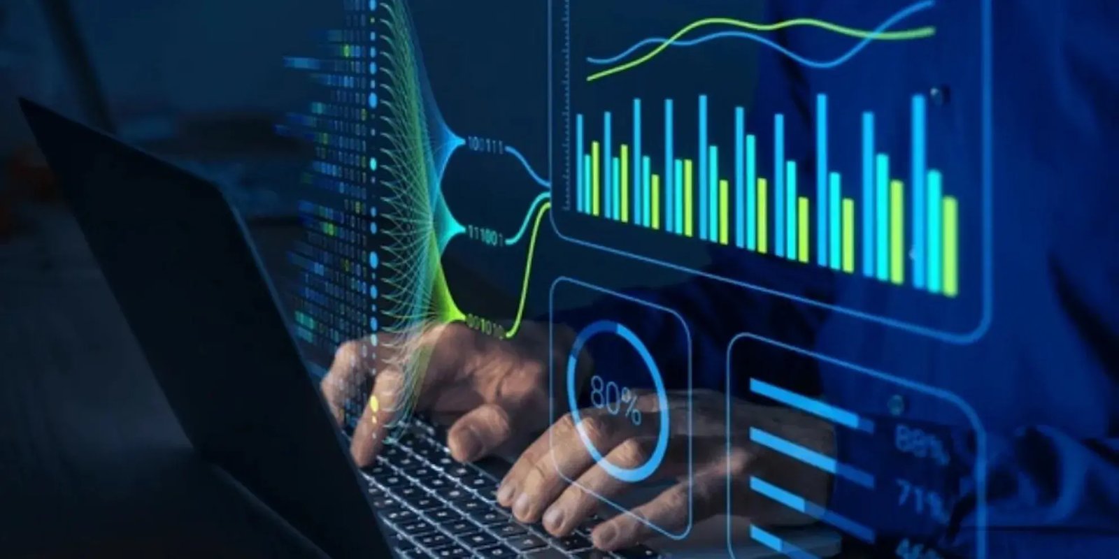 Een mens typed op een computer met allemaal charts om hem heen