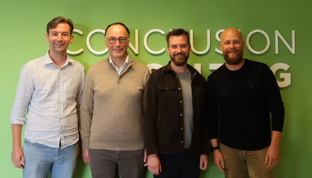 Groep mannelijke collega´s van Conclusion Consulting