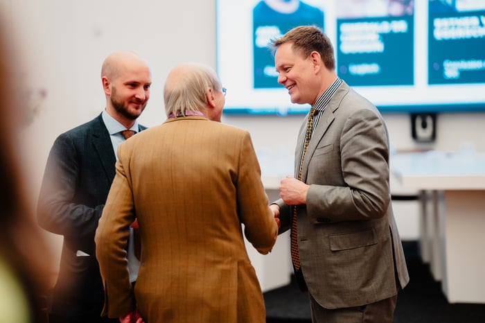 People chatting at the event