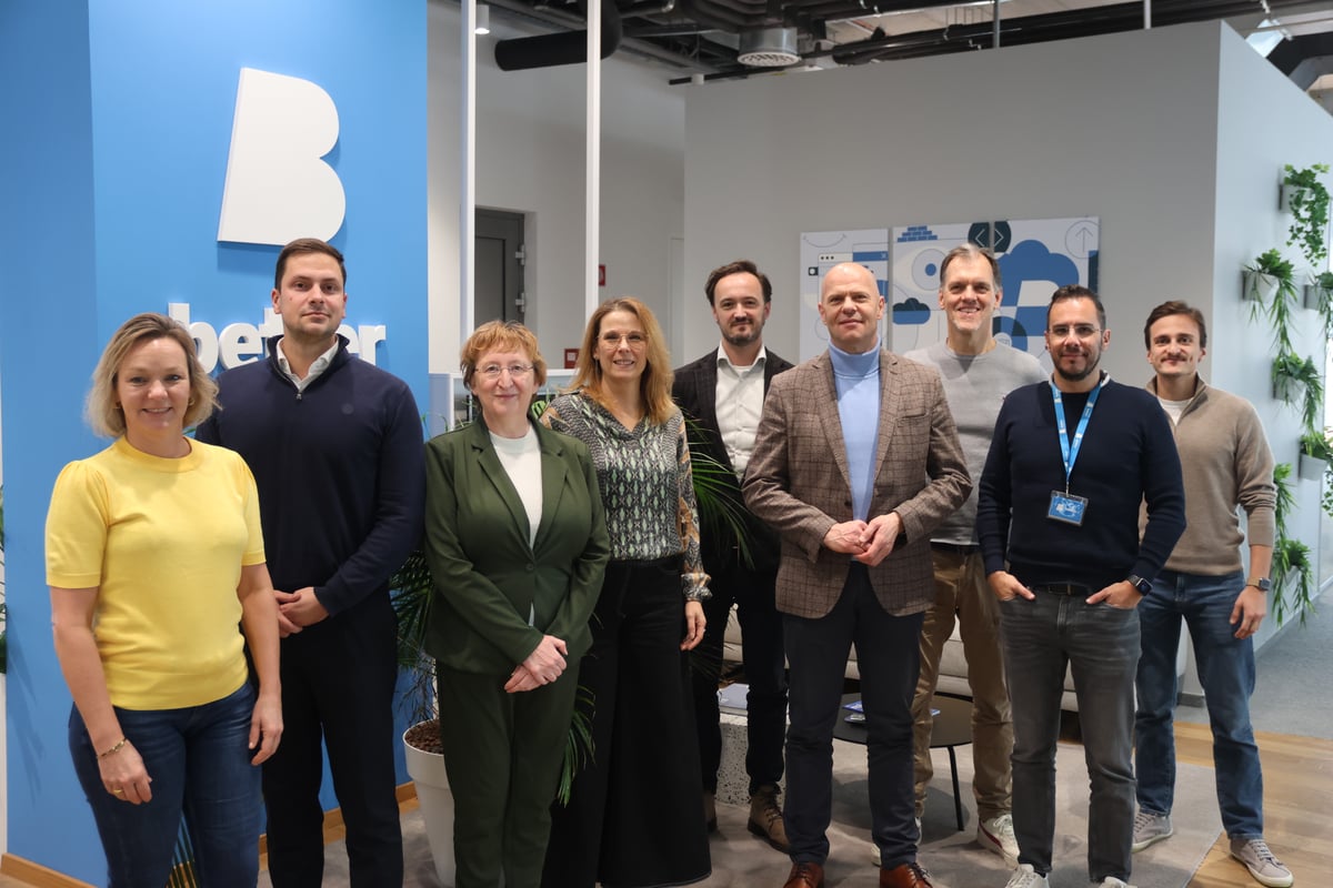 A group of both Conclusion and Better employees at the Better office.