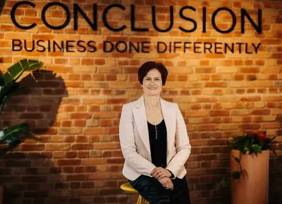 Celia Vieira woman sitting in chair