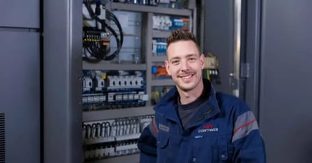 A man smiling at the camera