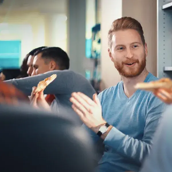 A Man with others around