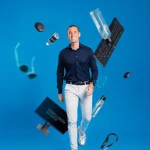 Angelo Kaijser walking surrounded by office supplies